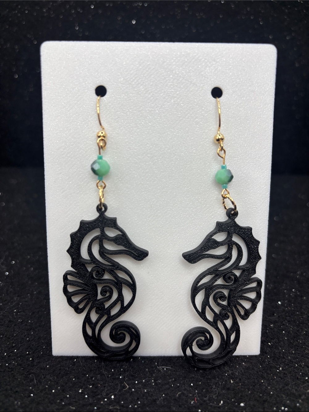 Black Seahorse Drop Earrings with Green Accent Bead